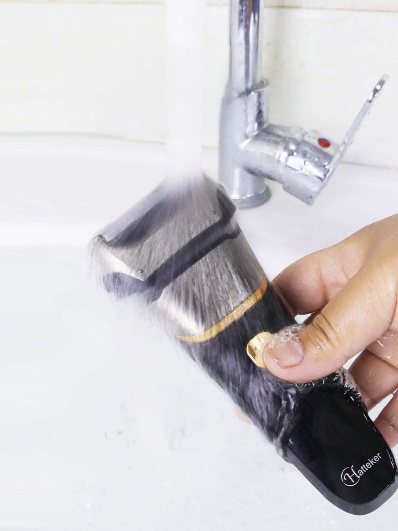 Silver electric foil shaver with LED display, Trendsi brand, showing close-up of the shaver's sleek design and control panel.