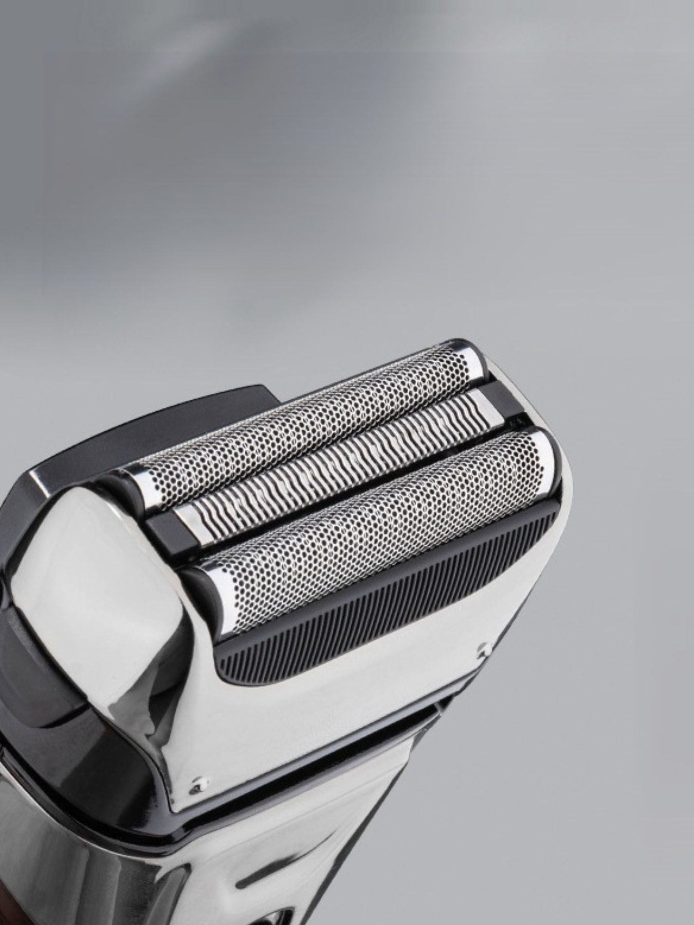 Silver electric shaver with digital display from Trendsi, showcasing a sleek, one-size design and close shave features.