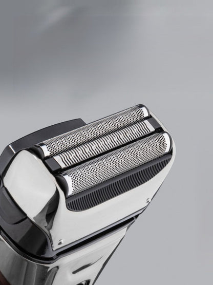 Silver electric shaver with digital display from Trendsi, showcasing a sleek, one-size design and close shave features.