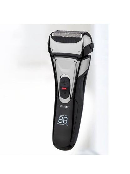 Silver electric shaver with digital display by Trendsi, featuring a sleek design and one-size fit for a close shave.
