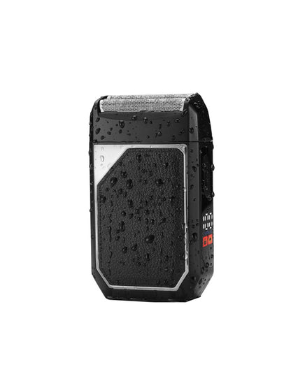 Silver portable electric foil shaver from Trendsi with a compact design and dual foil heads for close shaving.