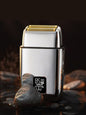 Silver rechargeable electric foil shaver with digital display, Trendsi brand, compact and ergonomic for precise facial hair grooming.