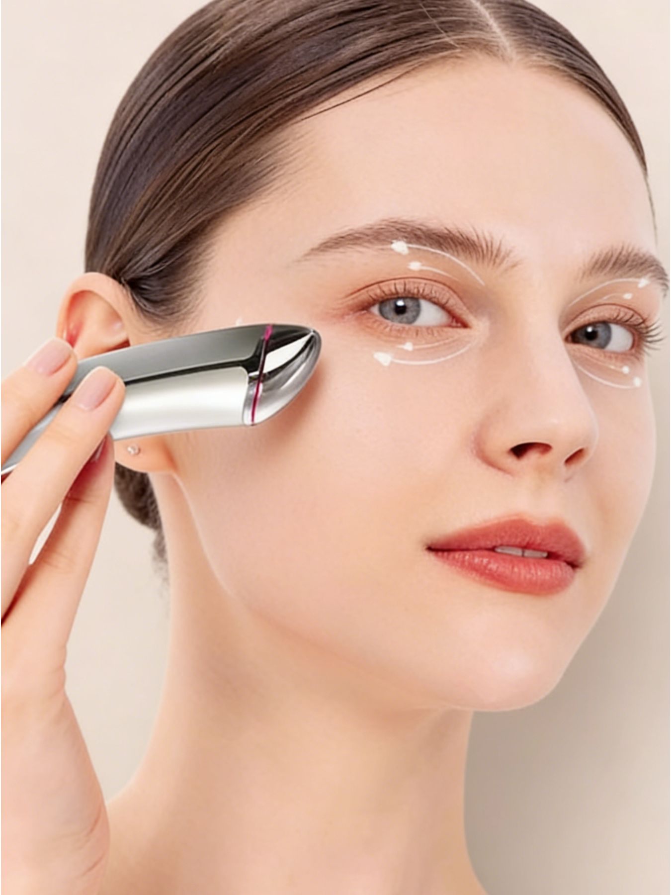 Silver facial lifting beauty device by Trendsi with ergonomic design for skin firming and anti-aging treatments.