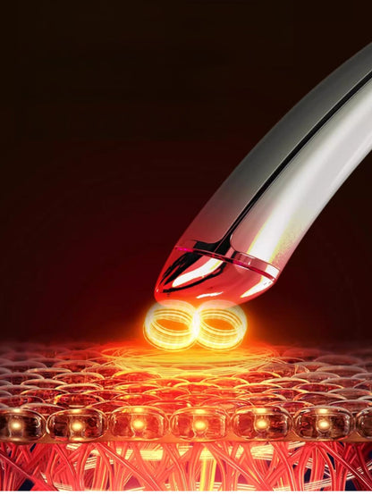 Silver facial lifting beauty device from Trendsi with ergonomic design for skincare and anti-aging treatment.