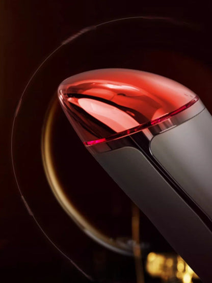 Silver Trendsi facial lifting beauty device with ergonomic design for skin tightening and facial toning.
