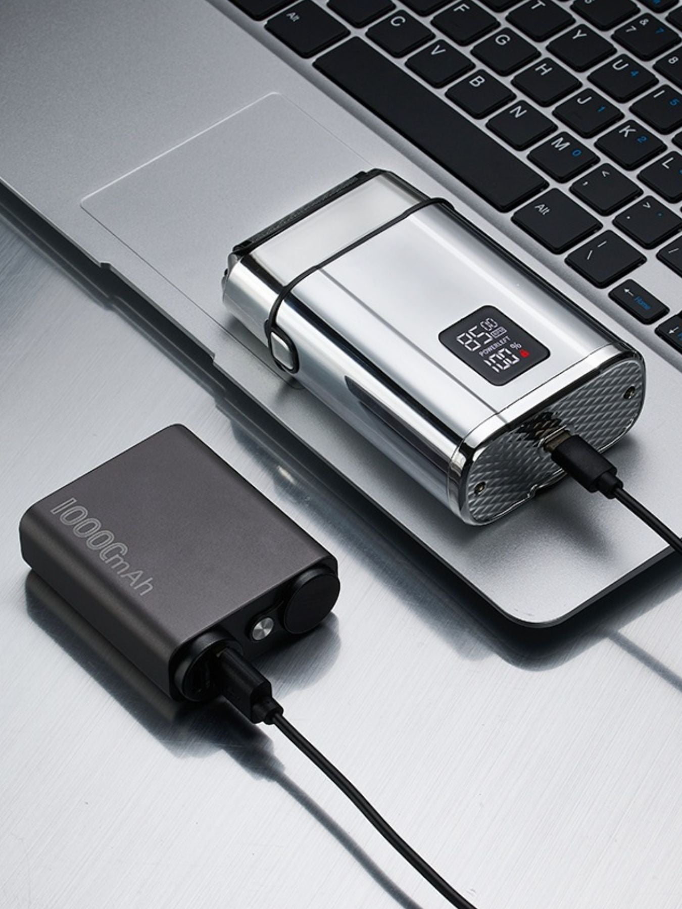 Silver waterproof electric shaver by Trendsi with a sleek design, suitable for dry and wet shaving.