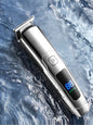 Silver waterproof hair clipper by Trendsi with LED display, featuring a sleek design and adjustable cutting length.