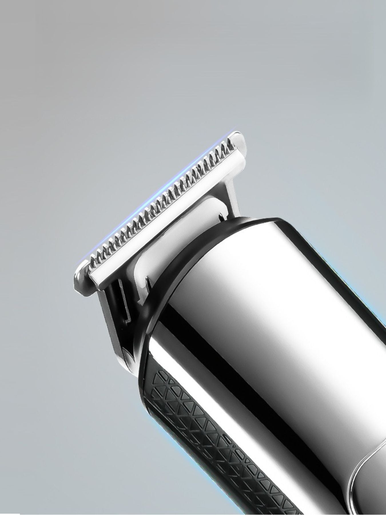 Silver waterproof hair clipper from Trendsi with LED display and ergonomic design for precise cutting.