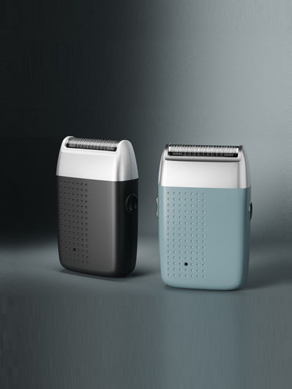 Sky blue portable electric shaver by Trendsi with a sleek design and compact size for easy grooming on the go.