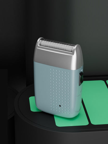 Sky blue portable electric shaver by Trendsi with a compact design, ideal for easy grooming on the go.