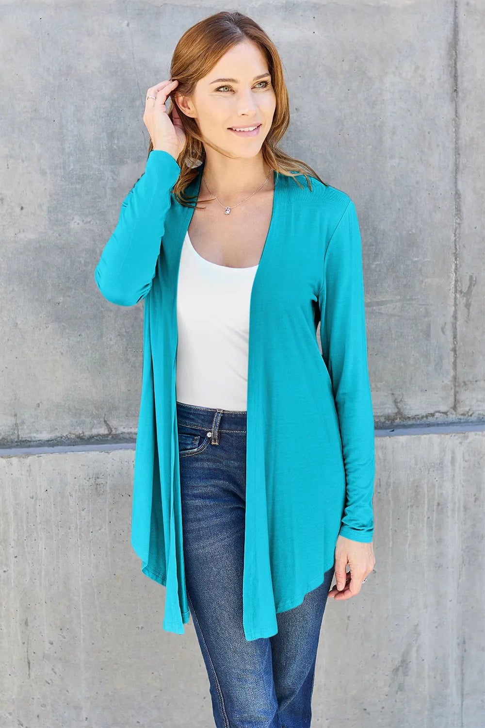 Sky blue Basic Bae full-size open front long sleeve cardigan from Trendsi, showing its soft fabric and relaxed fit.