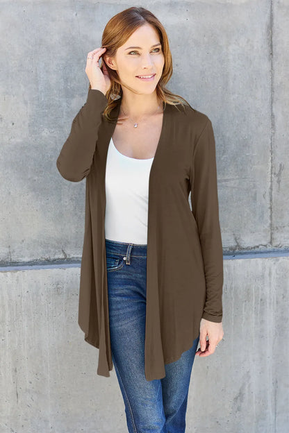 Sky-blue Trendsi Basic Bae open front long sleeve cardigan displayed on a hanger, showcasing its relaxed fit and soft fabric.
