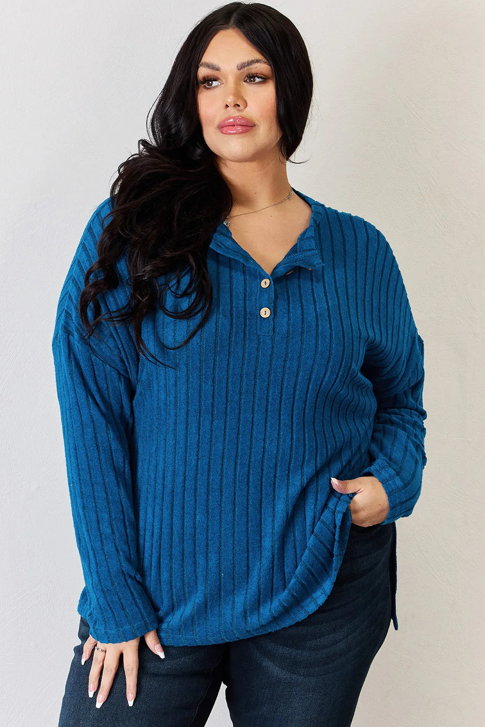 Sky blue Basic Bae long sleeve ribbed T-shirt with half-button front and high-low hem, stylish and comfortable from Trendsi.