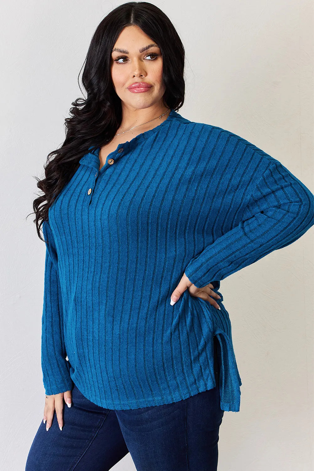 Sky blue Basic Bae ribbed long sleeve T-shirt with half-button detail and high-low hem by Trendsi, full size.