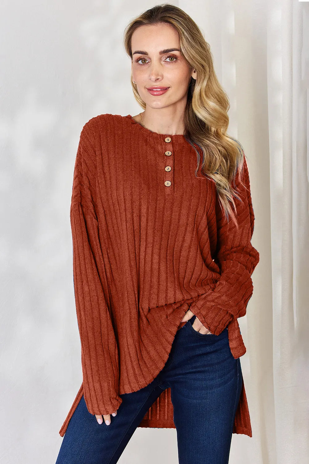 Sky-blue Trendsi Basic Bae ribbed long sleeve high-low T-shirt with half-button front and relaxed fit.