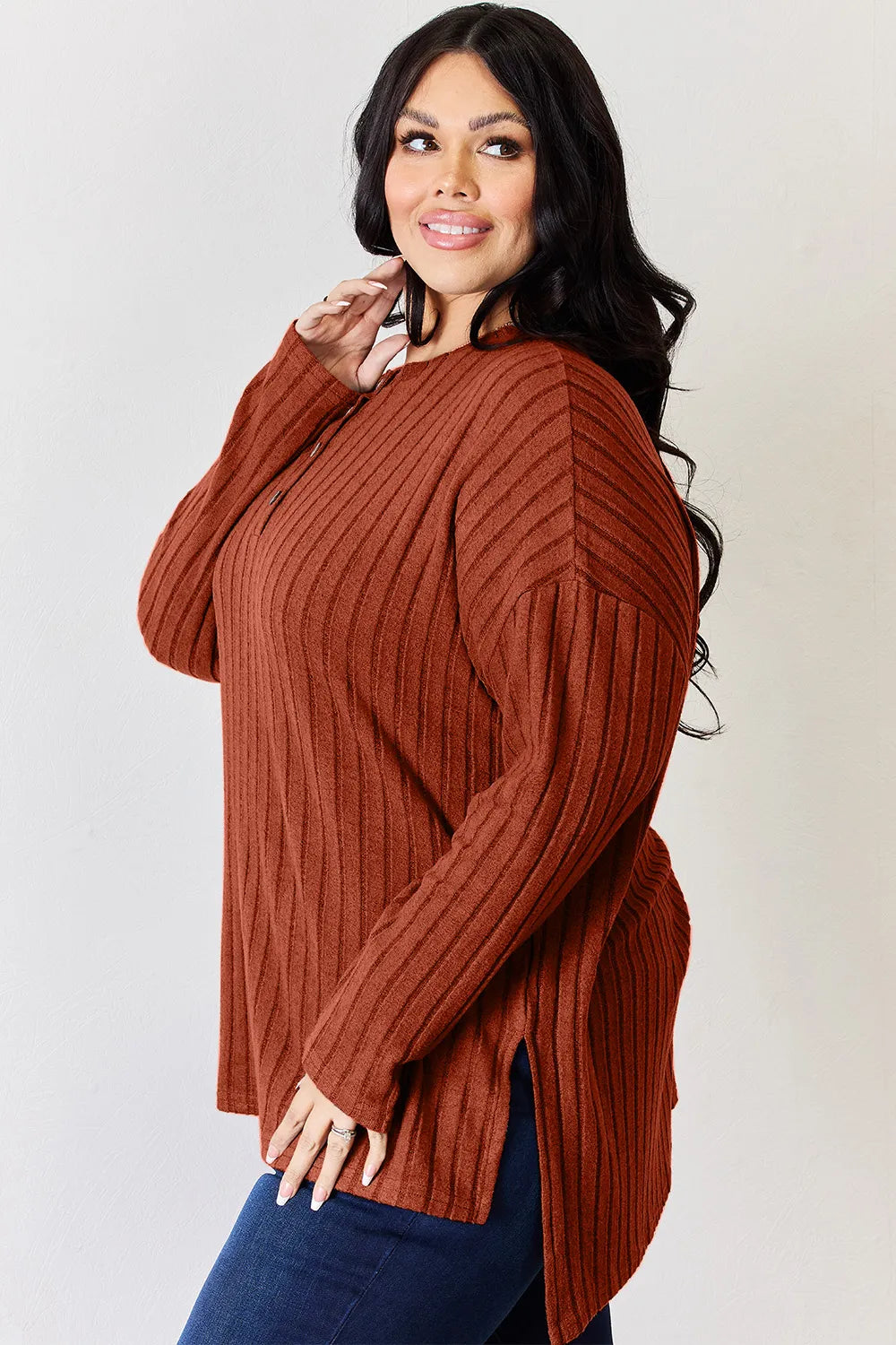 Sky-blue ribbed long sleeve T-shirt with half-button front and high-low hem, from Trendsi's Basic Bae collection.