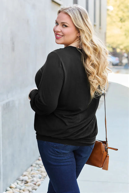 Sky blue Basic Bae full-size V-neck lantern sleeve top by Trendsi, featuring a relaxed fit and stylish long lantern sleeves.