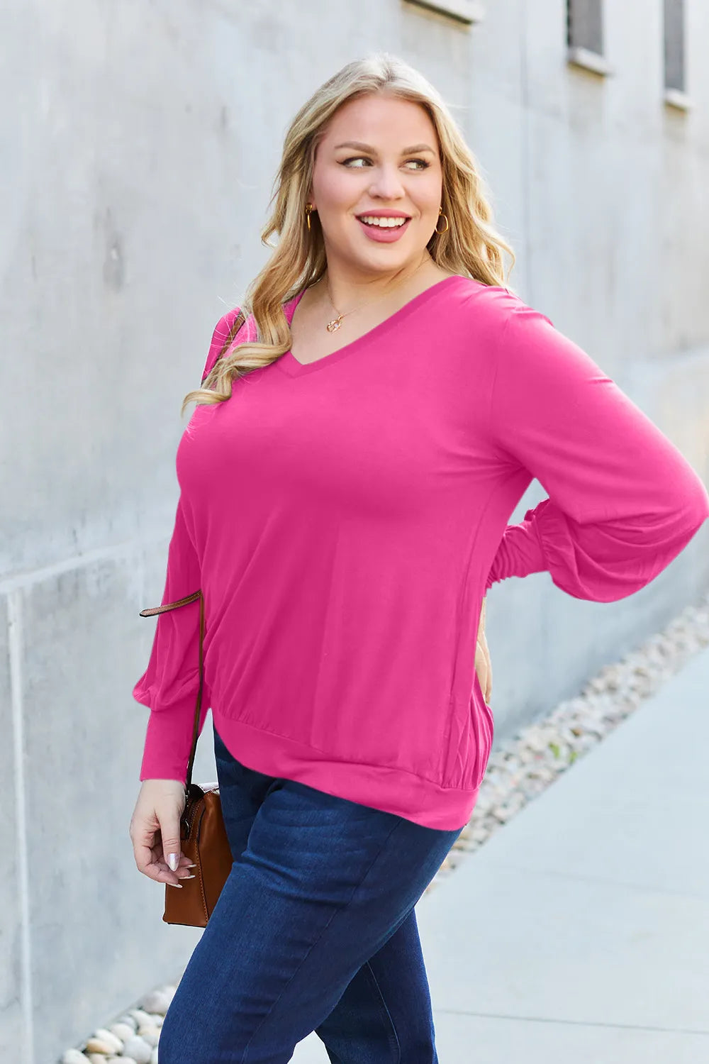 Sky blue Basic Bae V-neck lantern sleeve top by Trendsi, featuring a relaxed fit and stylish full-size design.