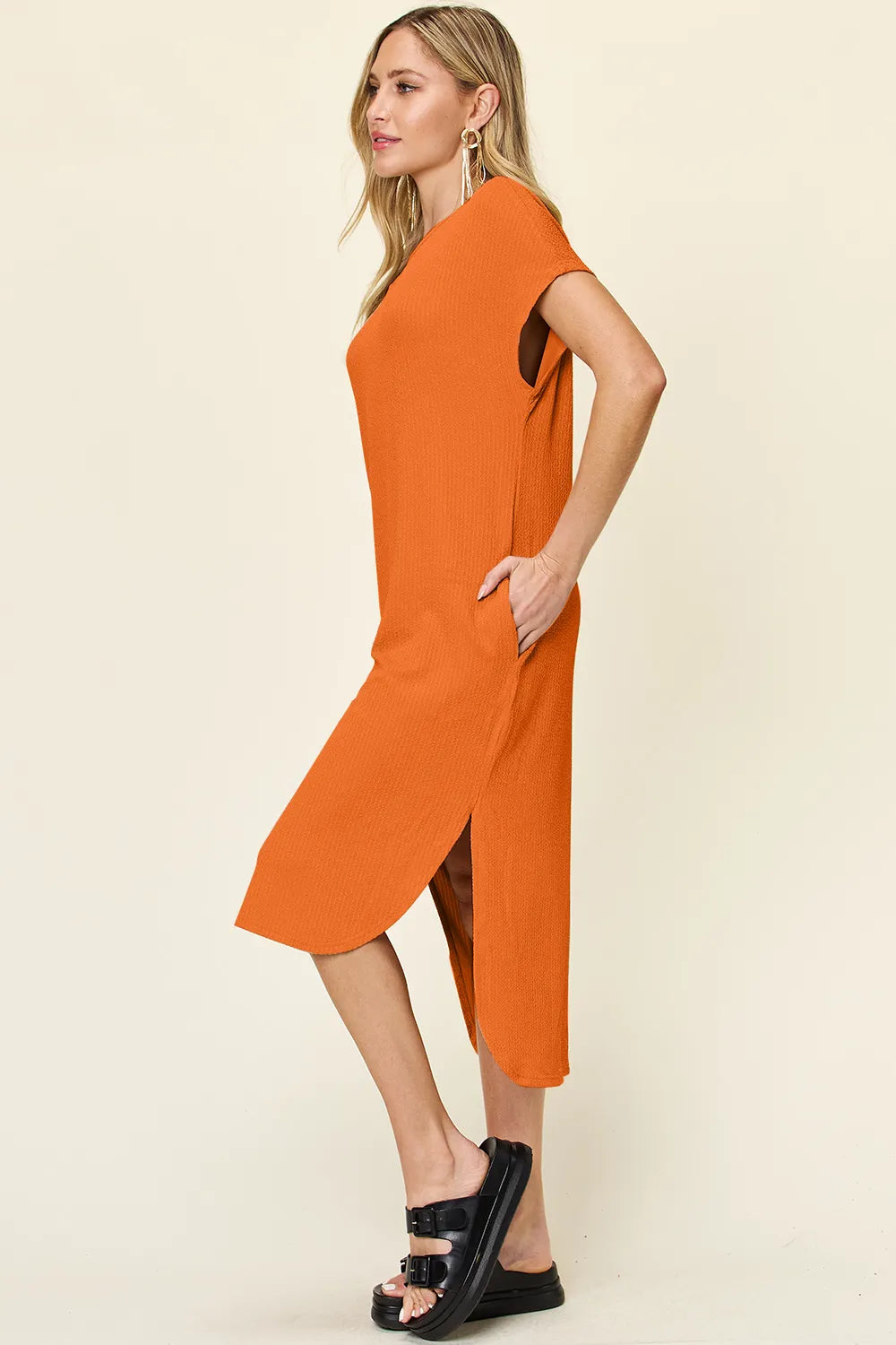 Sky blue double take full-size round neck short sleeve slit dress by Trendsi, showing the stylish casual dress with slit detail