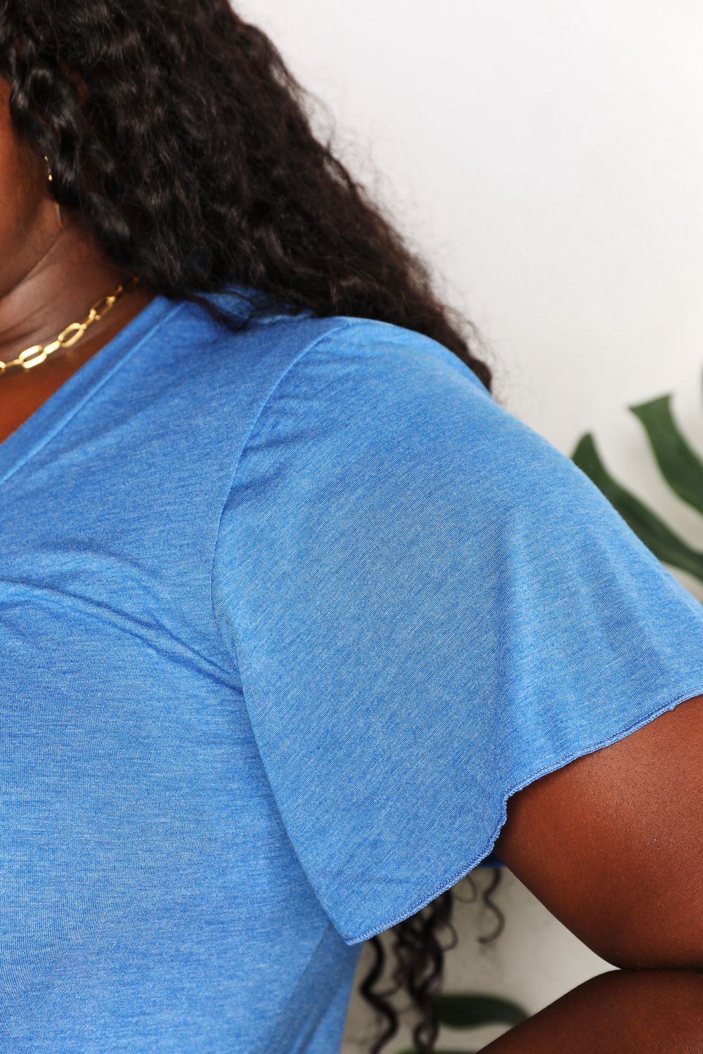 Sky blue double take ruched V-neck short sleeve T-shirt by Trendsi, featuring a fitted design and soft fabric.