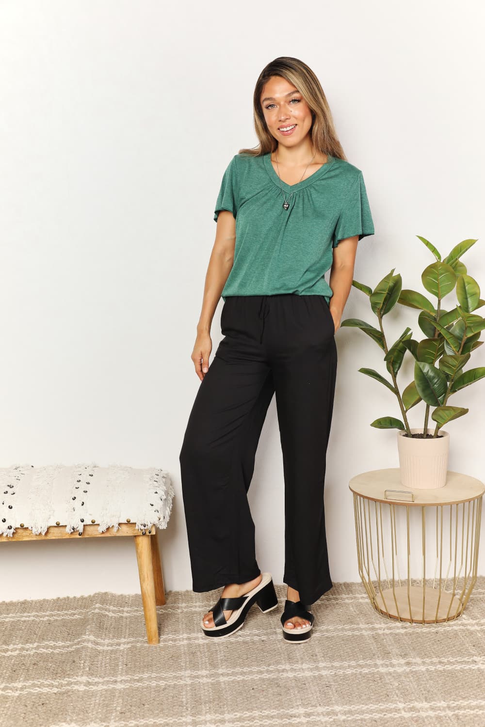 Sky-blue Trendsi Double Take Ruched V-Neck Short Sleeve T-Shirt, casual fitted top with ruched design and V-neck style.