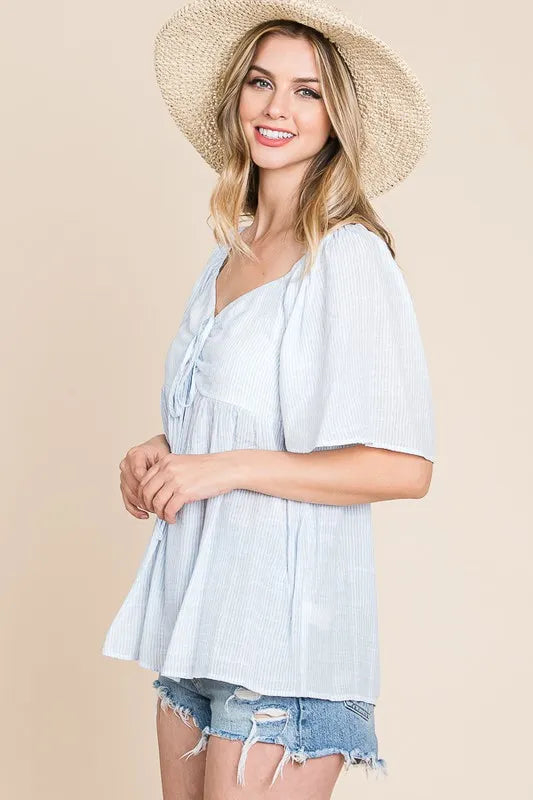 Sky blue Lime 'N' Chili thin striped tie-front babydoll top by Trendsi, featuring a relaxed fit and stylish design.