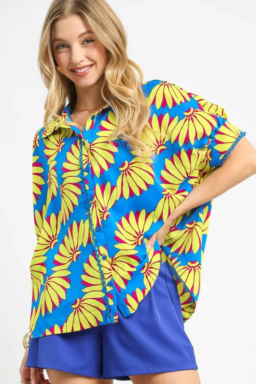 Sky blue Umgee printed button-up relaxed shirt with long sleeves and a casual fit, perfect for everyday wear.
