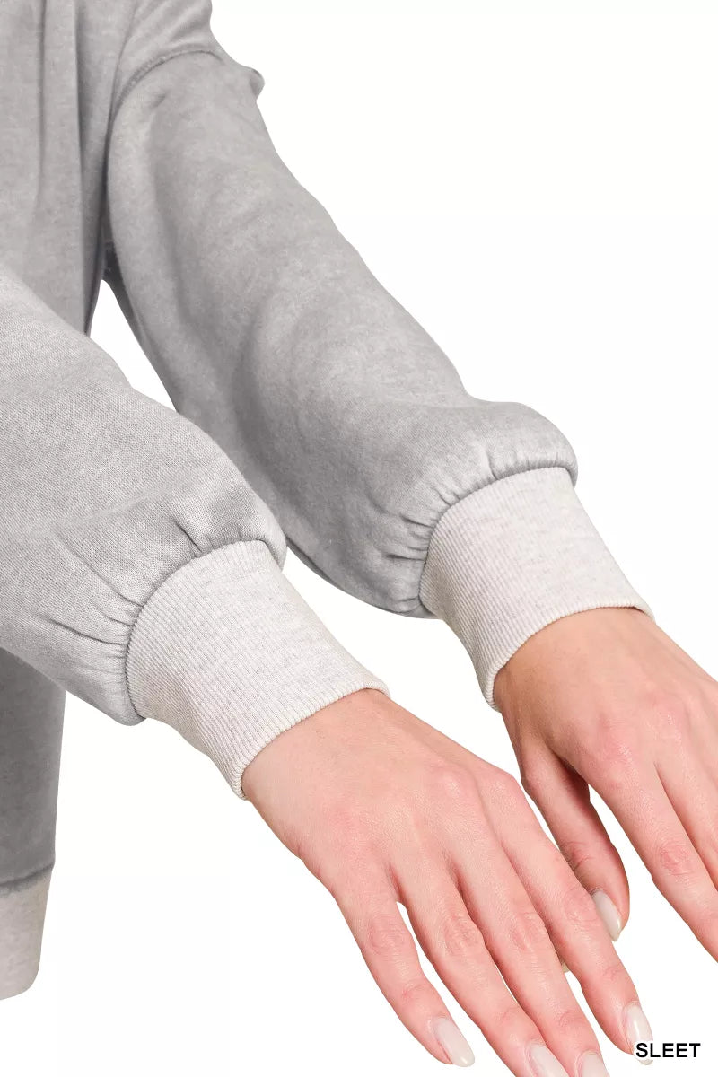 Zenana fleece acid-washed contrast trim pullover with cozy design, featuring stylish color accents and a relaxed fit.