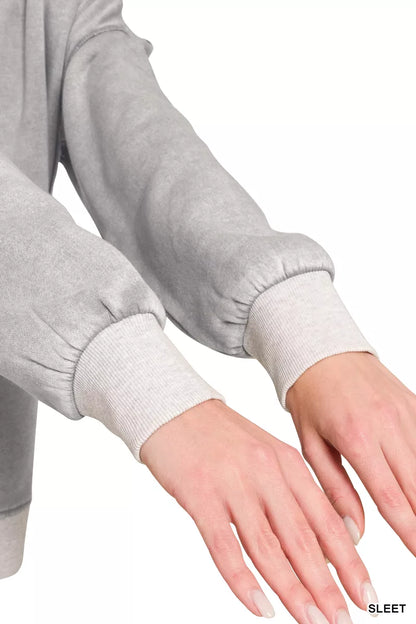 Zenana fleece acid-washed contrast trim pullover with cozy design, featuring stylish color accents and a relaxed fit.