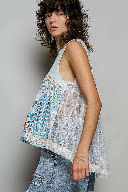 Pol floral V-neck sheer tank top with lace trim, stylish Trendsi women's sleeveless blouse featuring a delicate floral pattern.