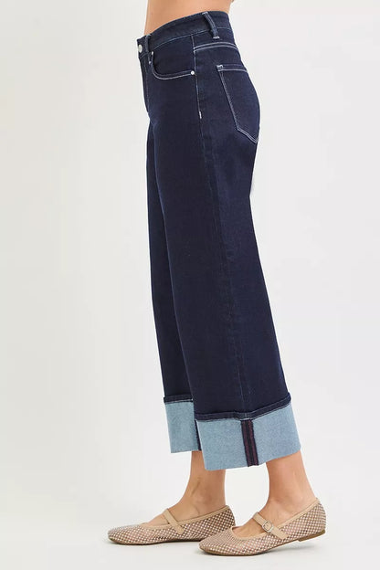 Risen slouchy crop barrel cuffed hem jeans in dark solid denim, relaxed fit with rolled-up cuffs and casual style.