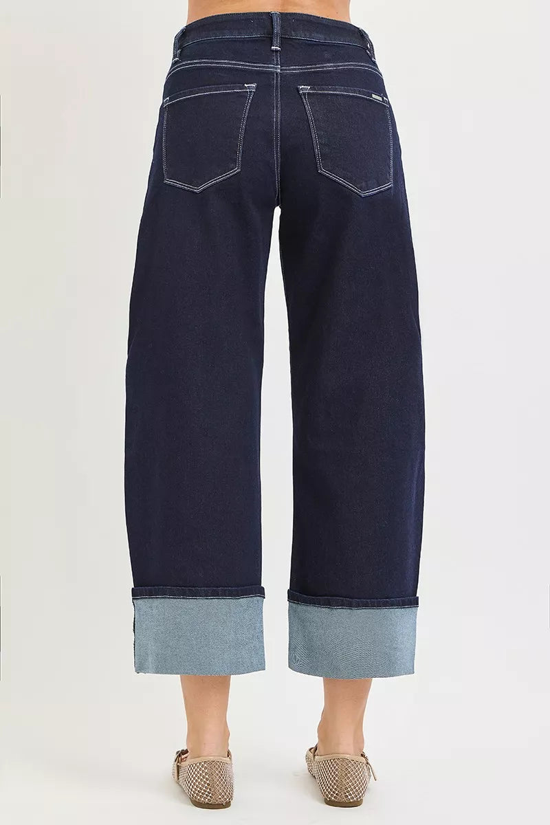 Dark blue RISEN slouchy crop jeans with barrel cuffs and relaxed fit, designed by Trendsi.