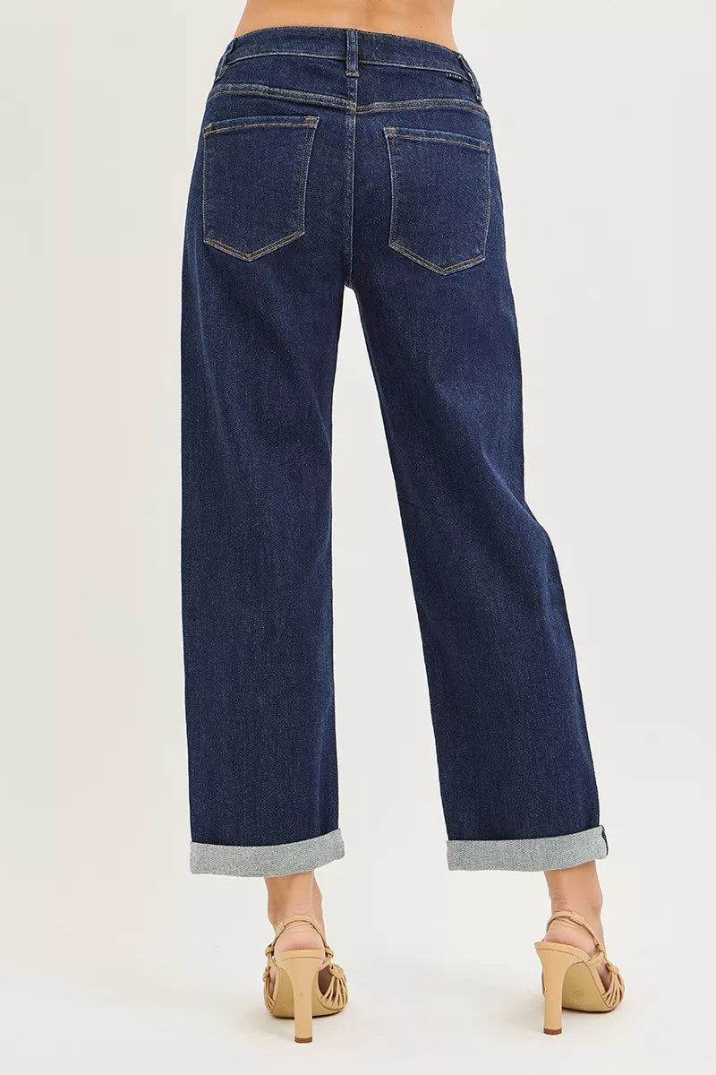 Dark blue RISEN slouchy cropped boyfriend jeans with cuffed hem, casual relaxed fit and distressed details.