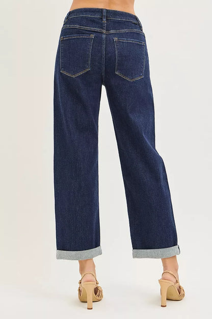 Dark blue RISEN slouchy cropped boyfriend jeans with cuffed hem, casual relaxed fit and distressed details.