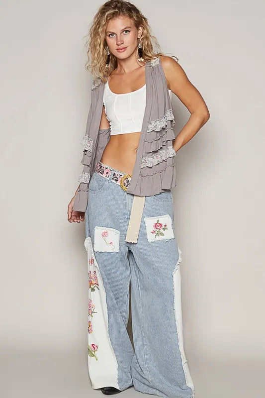 Stone grey multicolor sleeveless cardigan with ruffled open front, from Trendsi, featuring a stylish, layered design.