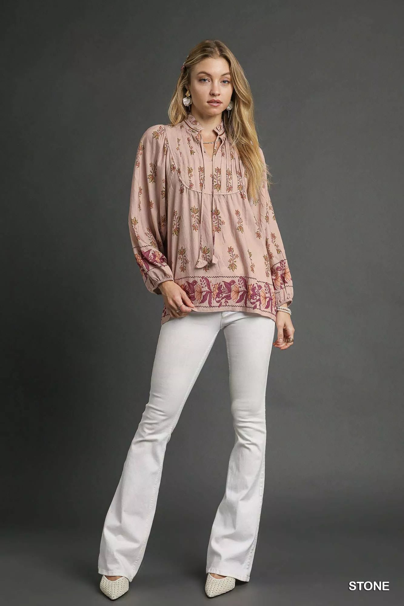 Floral boho peasant blouse by Umgee featuring a relaxed fit, lightweight fabric, and bohemian floral print.