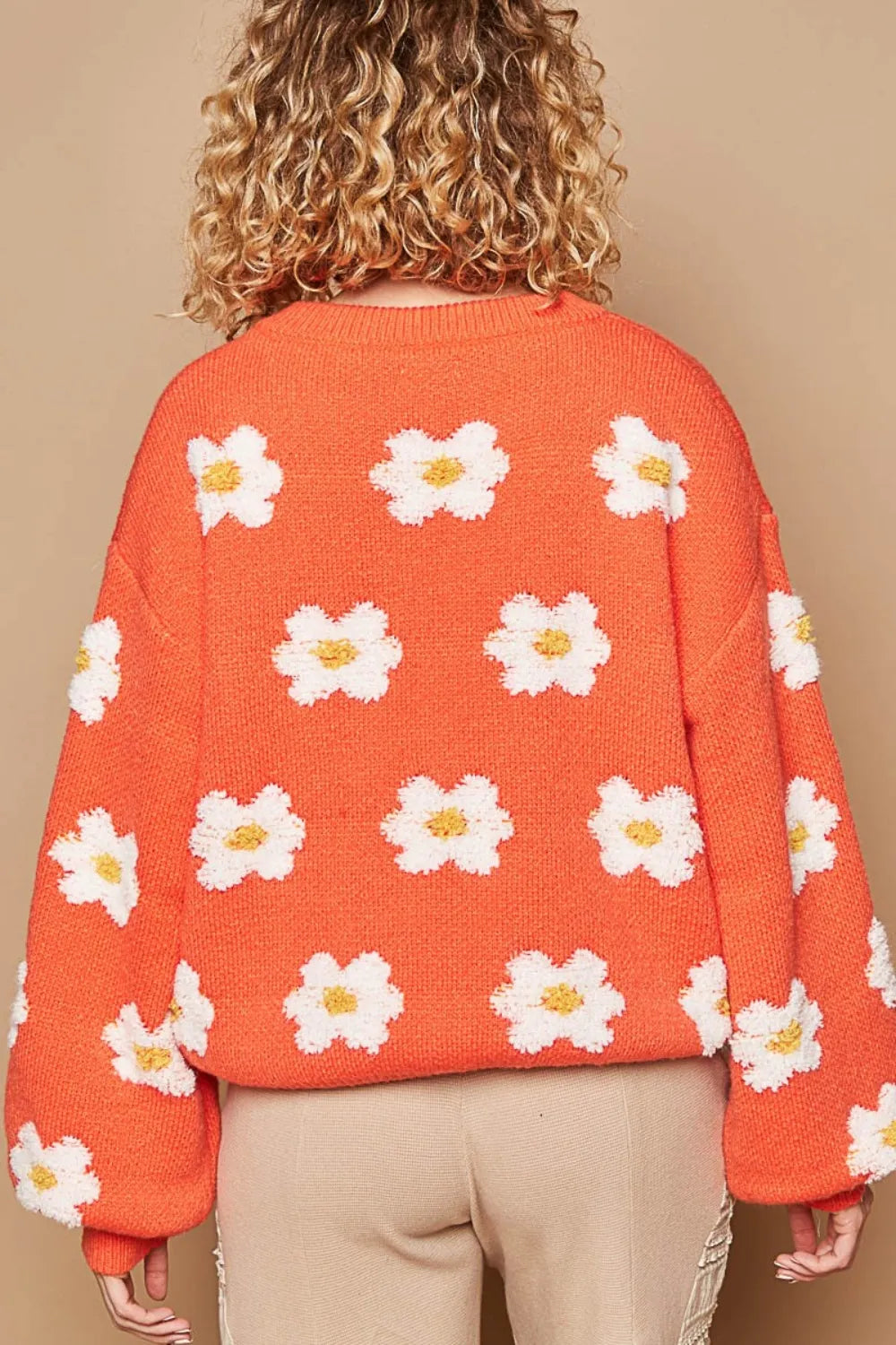 Sun orange POL Daisy Pattern Drop Shoulder Sweater from Trendsi featuring a cheerful daisy print and relaxed fit.