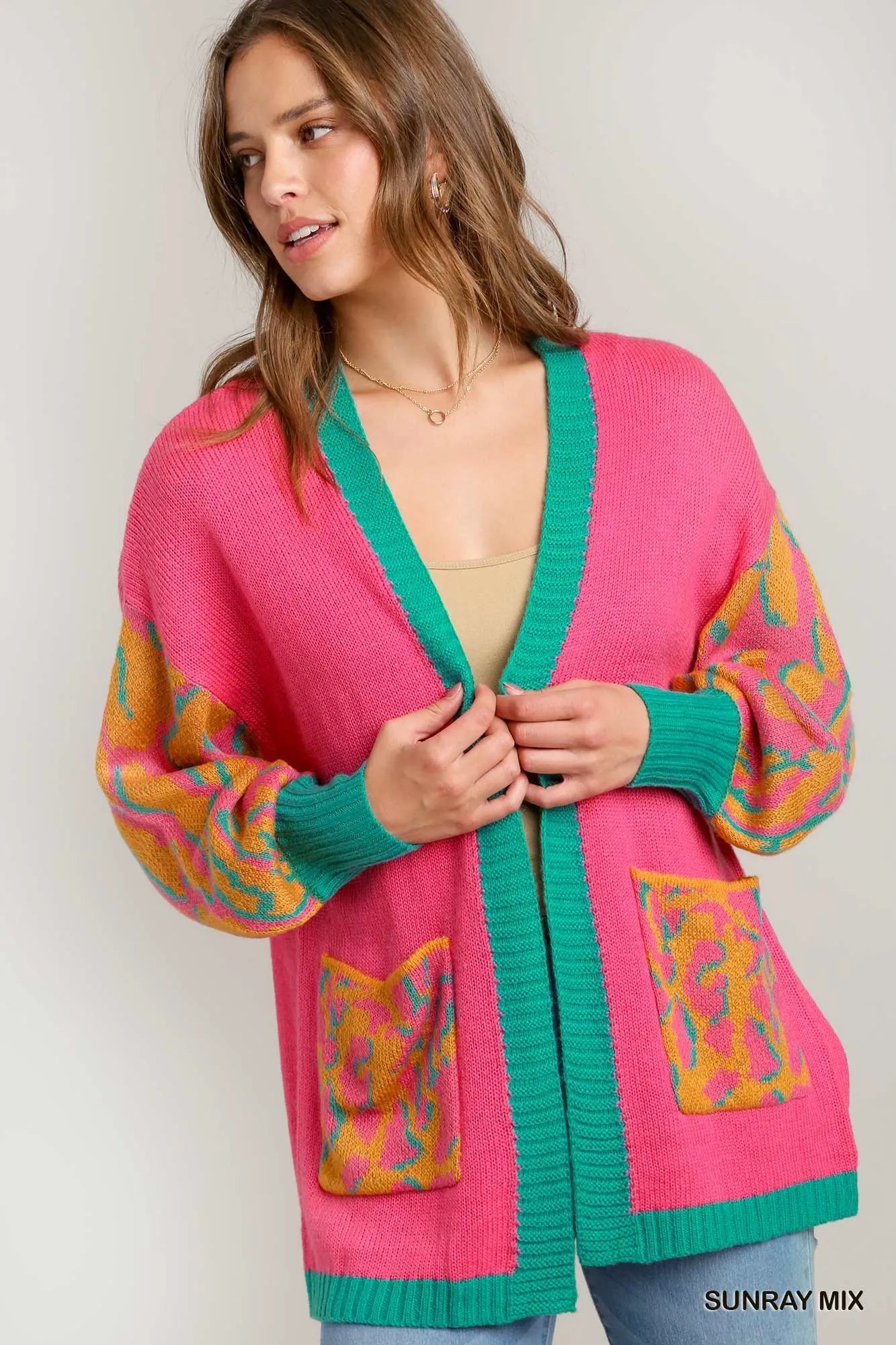 Animal print open front sweater cardigan by Umgee, featuring a cozy knit and stylish animal pattern, perfect for casual wear.