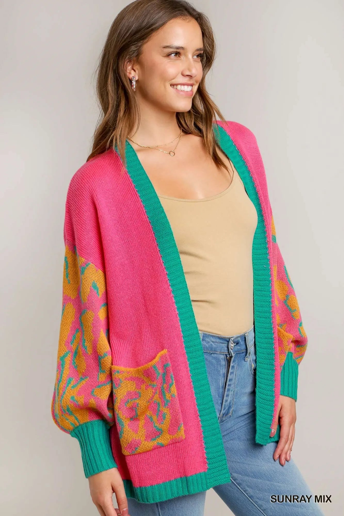 Animal print open front sweater cardigan by Umgee, featuring a cozy knit design and trendy animal pattern.