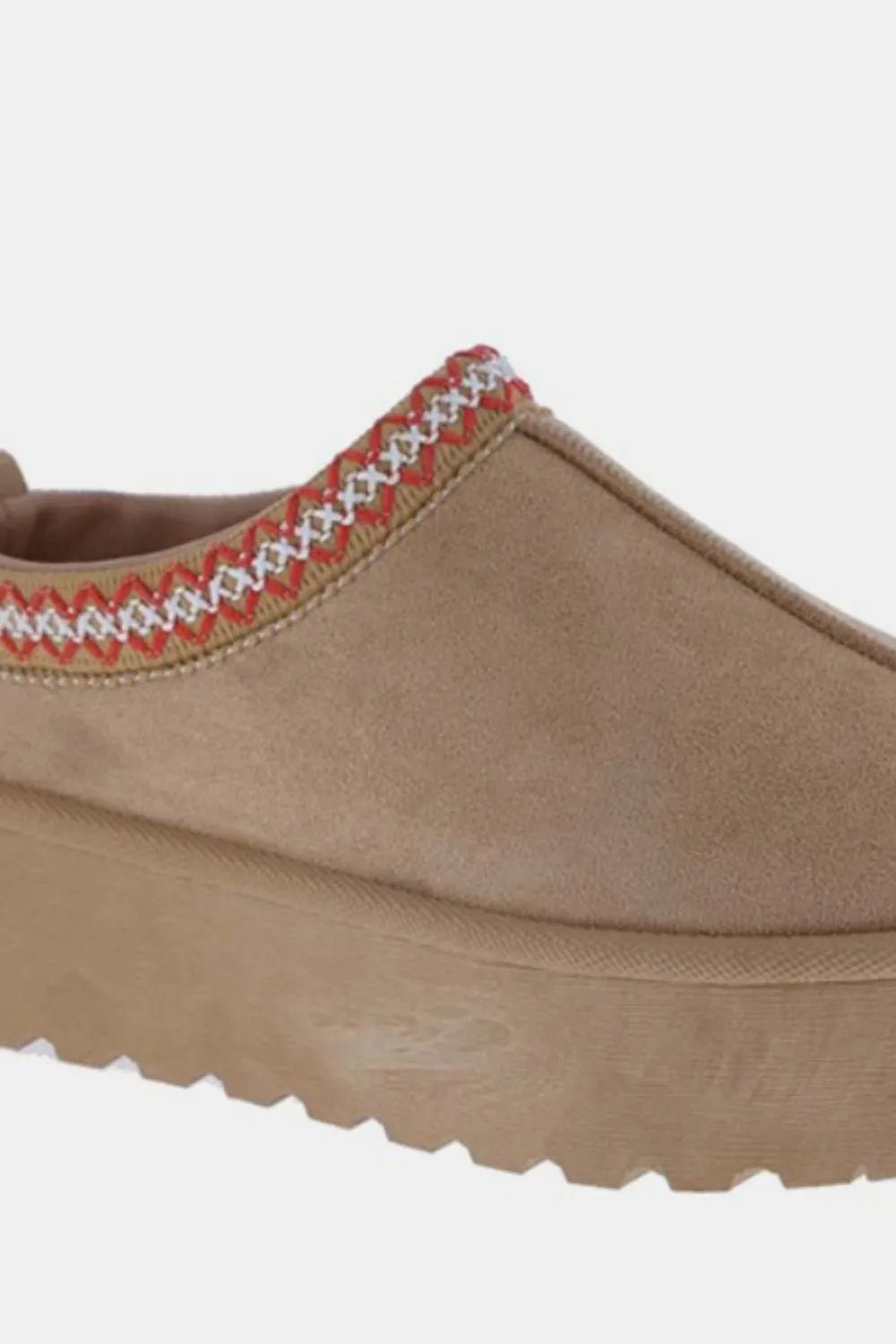 Tan Weeboo platform slip-on boots with embroidered trim and a trendy design, perfect for casual or stylish outfits.
