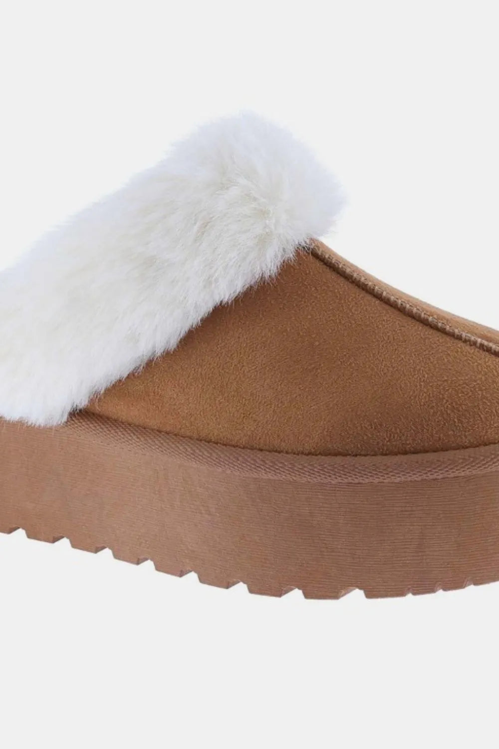 Tan Weeboo snow slippers with thick soles and fur trim, designed for warmth and comfort in winter weather.