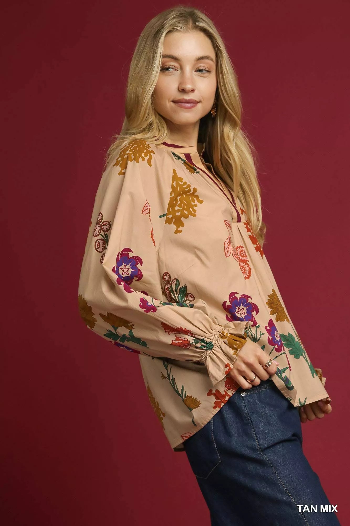 Tan floral print flounce sleeve blouse by Umgee featuring a relaxed fit and feminine ruffle accents.