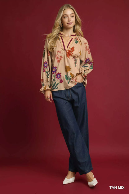 Tan floral print Umgee blouse with flounce sleeves, showcased on a model, perfect for casual or boho-inspired outfits.