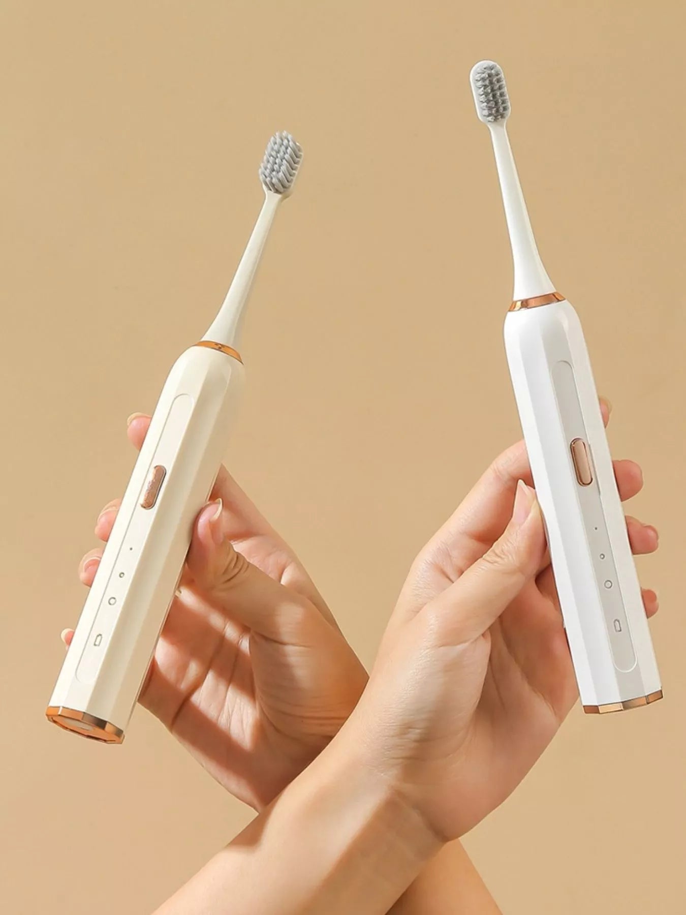 Trendsi smart electric toothbrush with tan handle and ergonomic design, showing brushing head and sleek modern appearance.