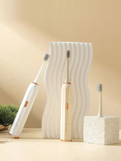 Trendsi smart electric toothbrush with tan handle and brushing heads, designed for effective oral cleaning and dental care.
