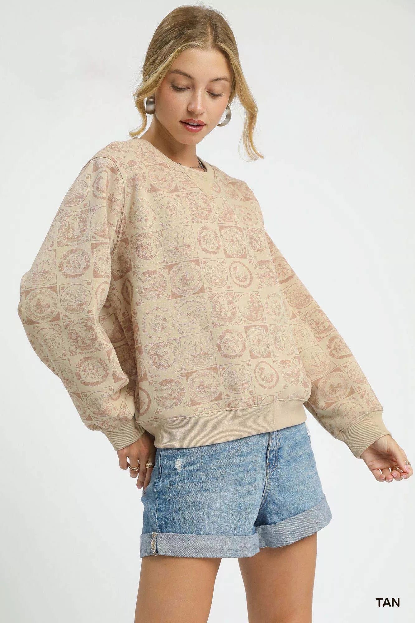 Tan Umgee coin stamp print sweatshirt with long sleeves and relaxed fit, casual style for comfortable everyday wear.