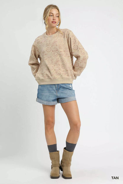 Tan Umgee coin stamp print sweatshirt with a relaxed fit, featuring a vintage-inspired graphic design on soft fabric.