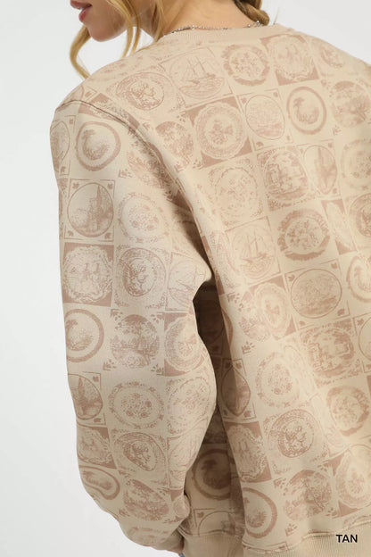 Tan Umgee coin stamp print sweatshirt with a relaxed fit, featuring a vintage-inspired coin design and casual style.