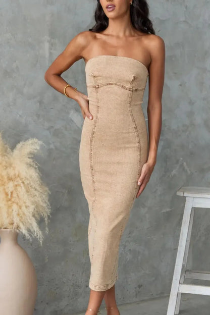 Washed tan slit-back tube denim dress by Trendsi, featuring a fitted silhouette and stylish back slit for a casual chic look.
