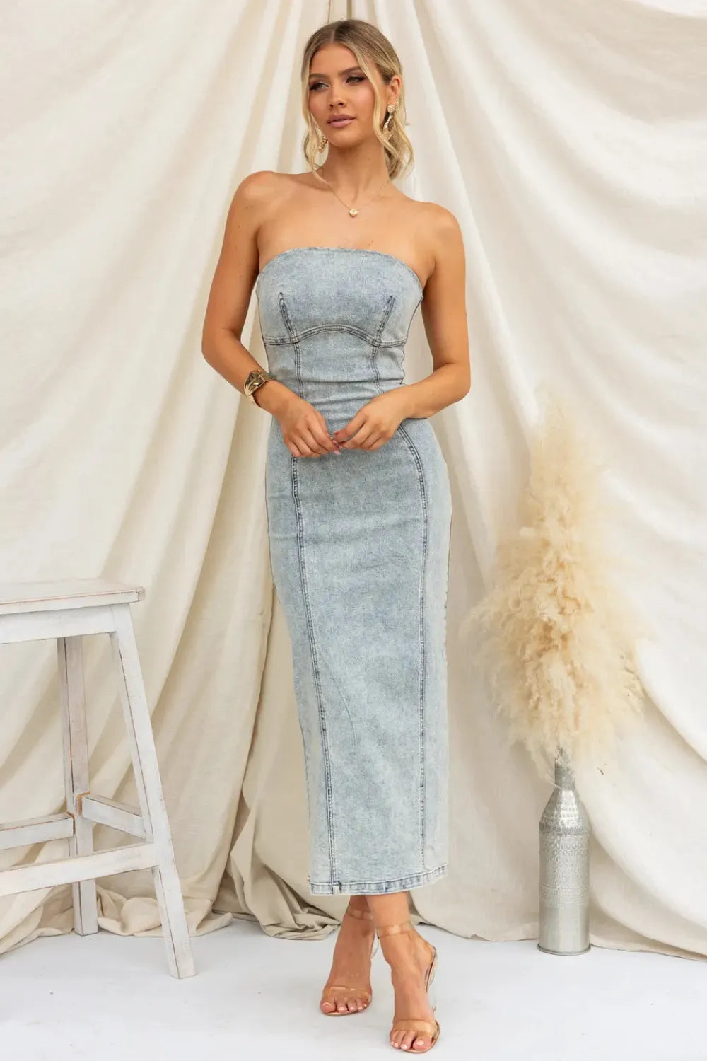 Tan washed denim slit back tube dress by Trendsi, featuring a fitted silhouette and stylish back slit detail.